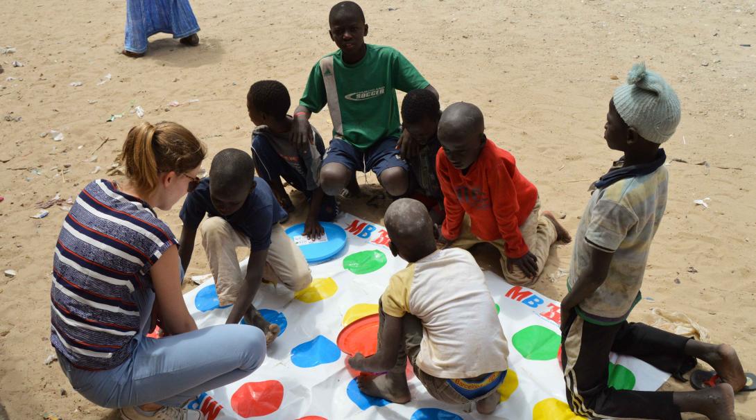 During a High School Special volunteers assist local staff with the education of children in Senegal. A Projects Abroad volunteer is working with children in Senegal during her High School Special summer program.